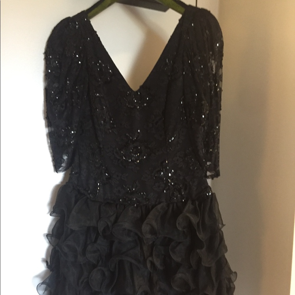 Black classy evening dress beaded on top